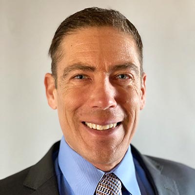 Dr. Joerg H Skomrock