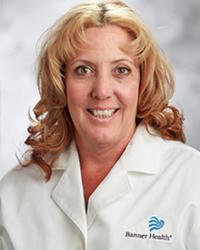 Dr. Janelle                                         Vesely