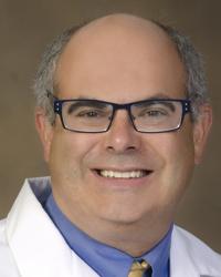 Dr. James                                                           Knepler