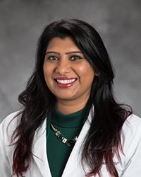 Dr. Navpreet                                                         Sidhu