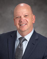 Dr. J.                                  David Cowden