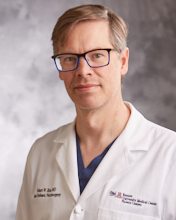Dr. Robert                                                               Bina