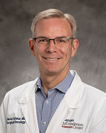 Dr. David                 Schnur