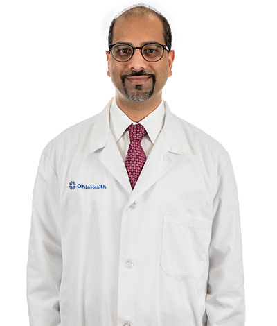 Dr. Akeek        S  Bhatt